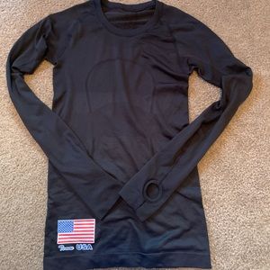 Luke on black swiftly tech long sleeve